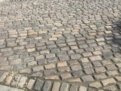 Leicester Paving and Patio Contractors Laying Cobblestones in Leicester Leicester Paving and Patio Contractors Laying Cobblestones in Leicester