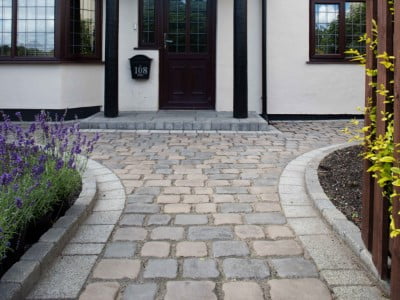 Leicester Paving and Patio Contractors Laying Cobblestones in Leicester Leicester Paving and Patio Contractors Laying Cobblestones in Leicester